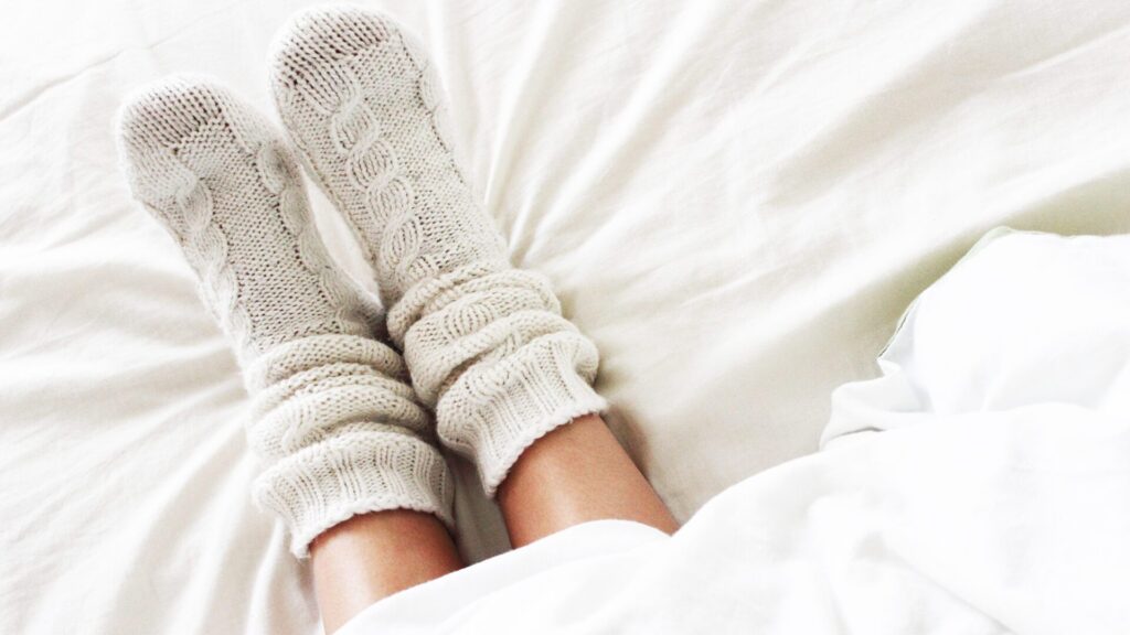 If you sleep with socks on, it says a lot about your personality.