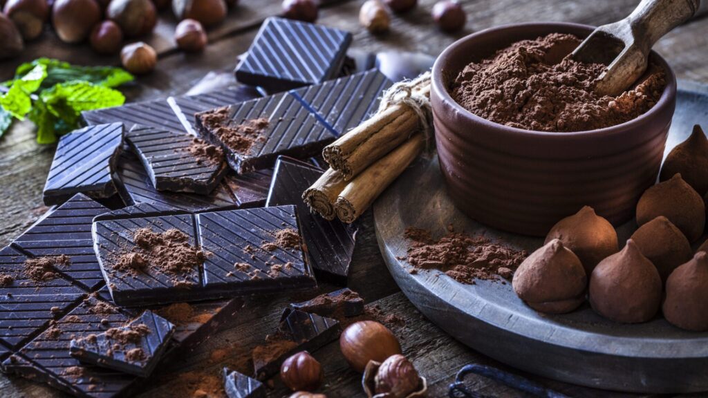 Dark chocolate contains theobromine, which may have positive effects on heart health.