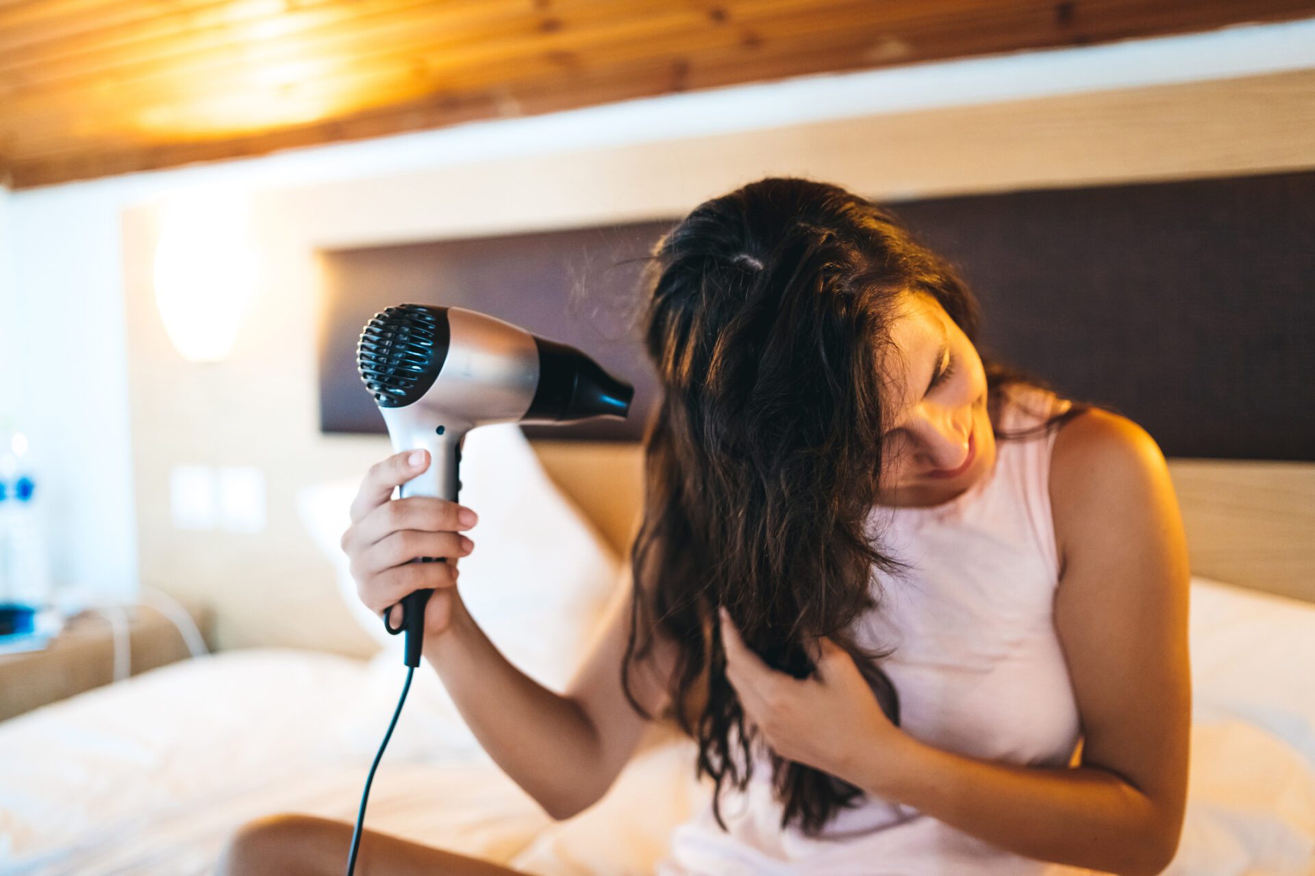 Dry your hair at least a little before going to bed.