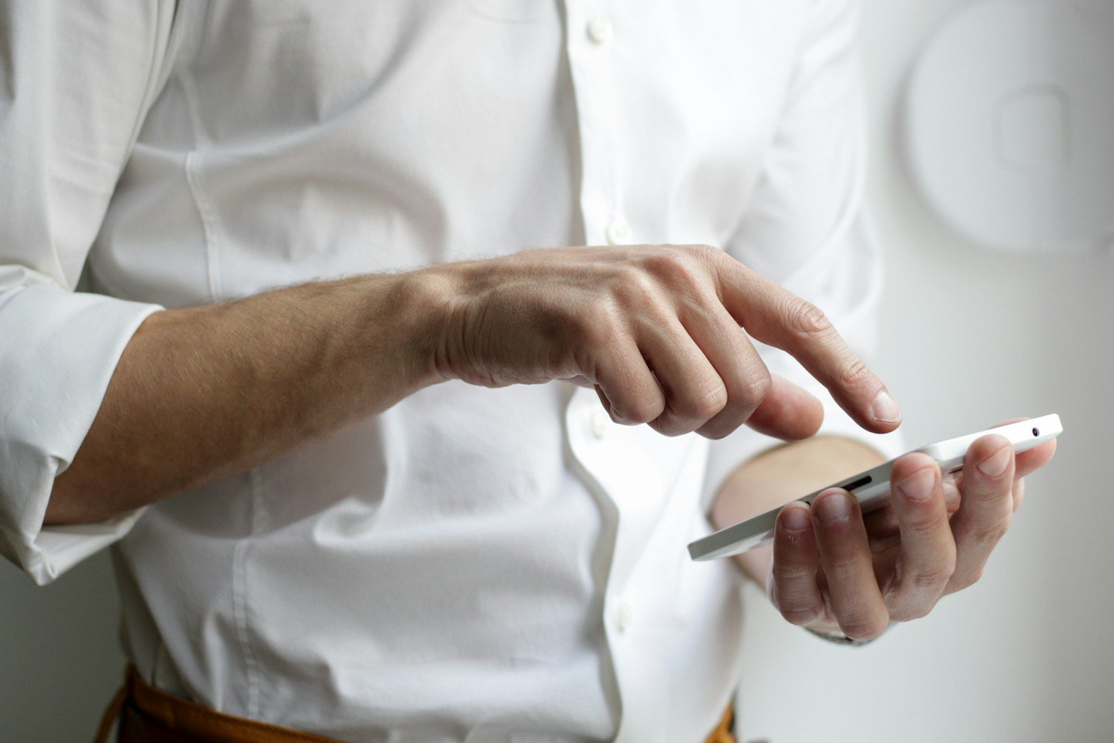 The way you hold your mobile phone can say a lot about you.